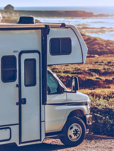 beach rv site of a motorhome parked on a bluff